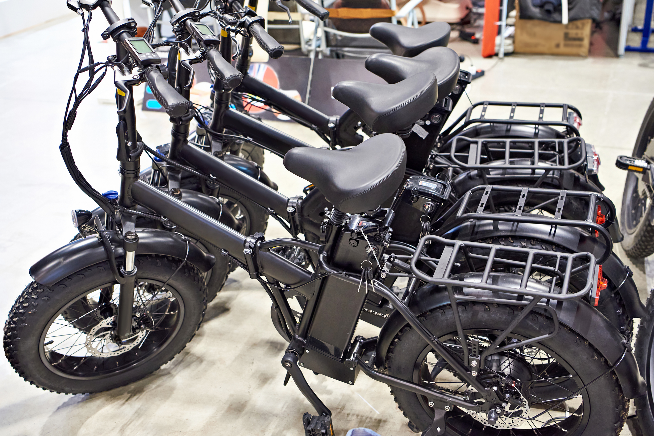 Black electric bicycles in shop
